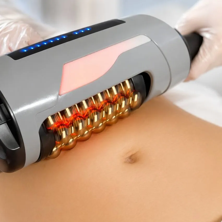 The Endosphere roller handpiece with its gold rollers against the stomach